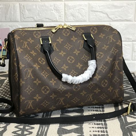 lv speedy 30 with strap.